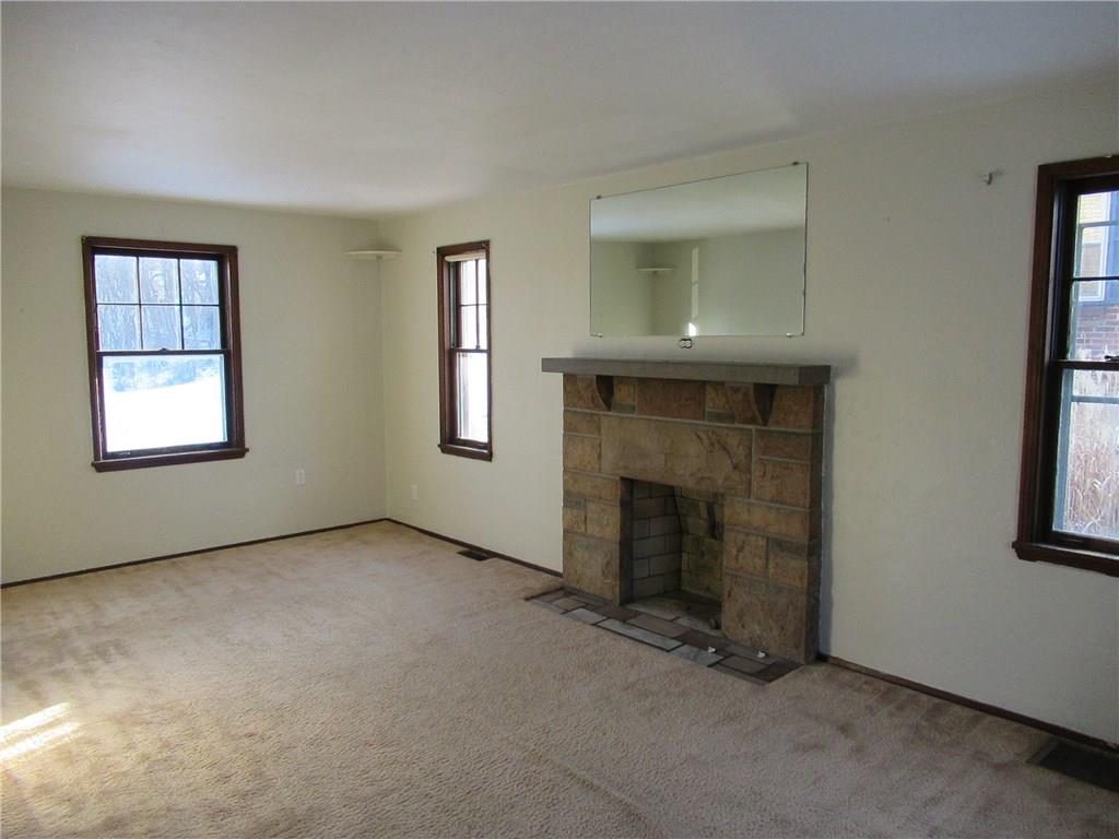 824 Geyer Road Pittsburgh, PA 15212 - Photo 2 of 21 Living room freshly painted with stone fireplace