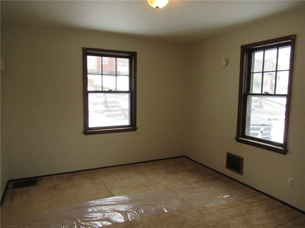 824 Geyer Road Pittsburgh, PA 15212 - Photo 6 of 21 freshly painted dining room with original hardwood floors under carpet