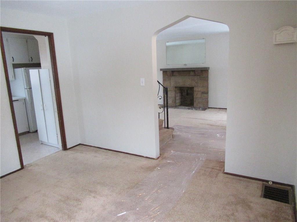 824 Geyer Road Pittsburgh, PA 15212 - Photo 7 of 21 Dining room looking into the living room and kitchen to the left