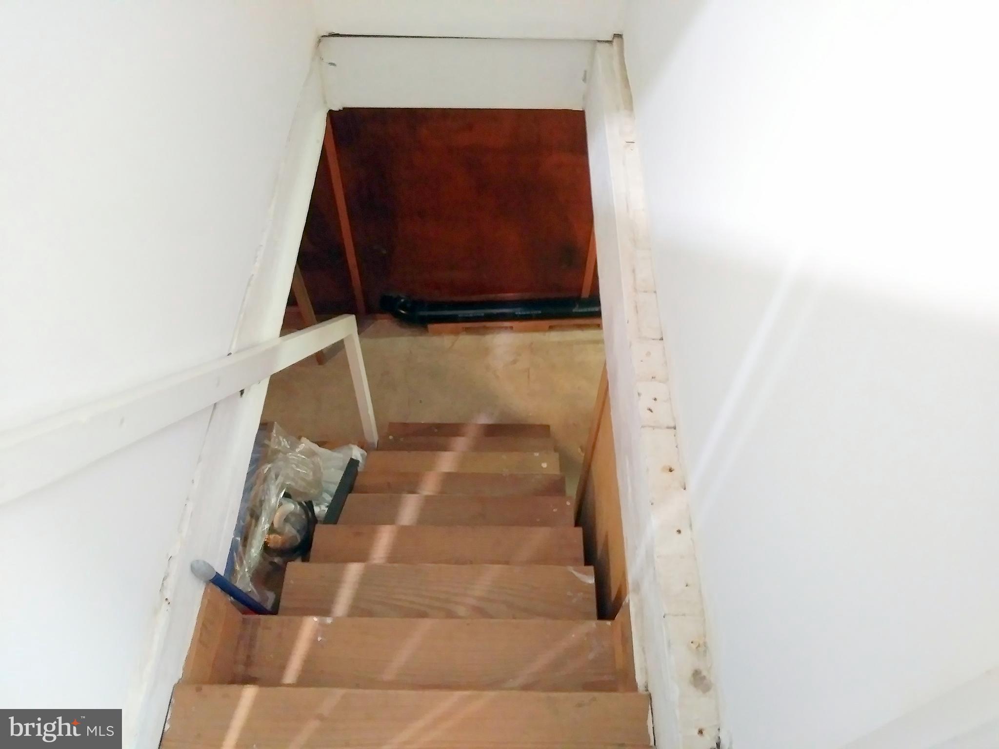 a living room with a wooden floor