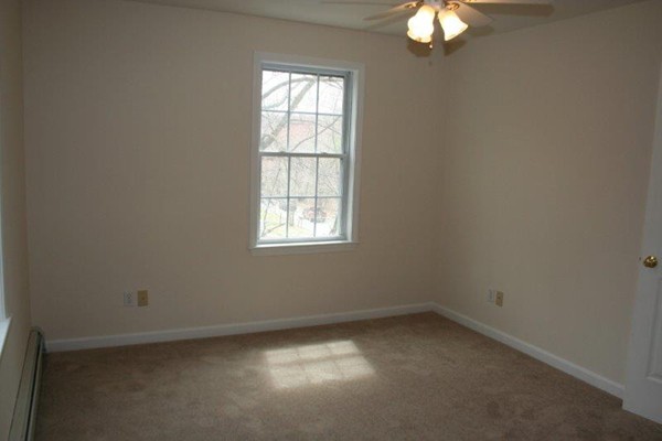 206 Boxford Road Haverhill, MA 01835 - Photo 6 of 11 an empty room with a window