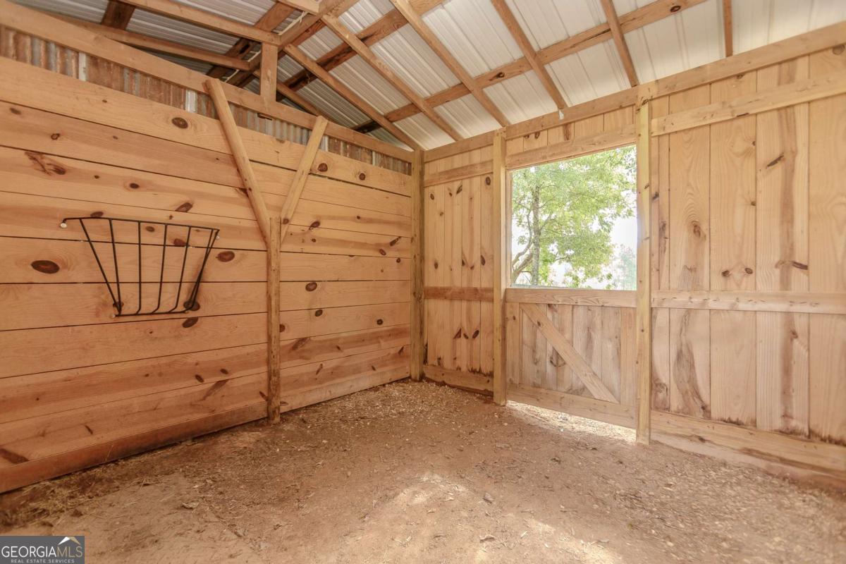 6441 Hog Mountain Road Bogart, GA 30622 - Photo 42 of 57 a view of a room with racks on the wall
