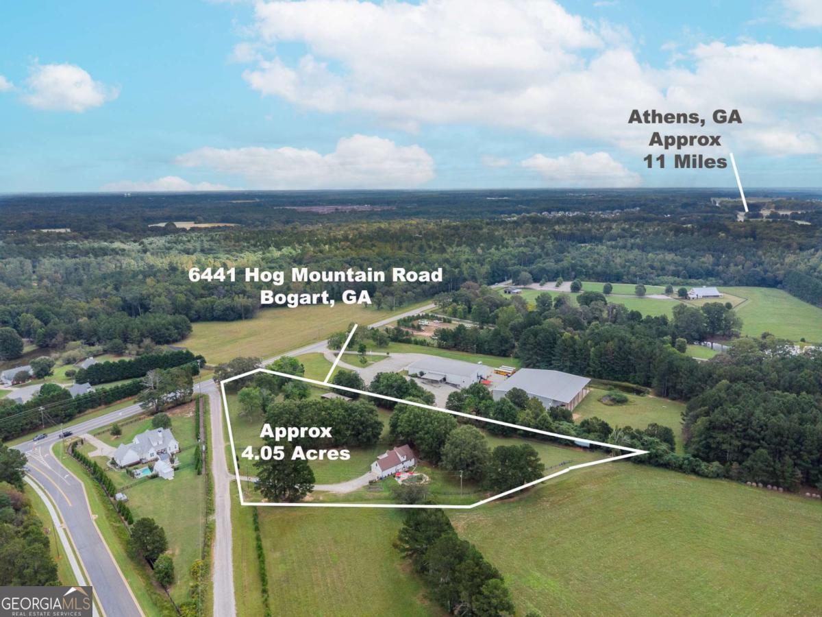 6441 Hog Mountain Road Bogart, GA 30622 - Photo 48 of 57 a view of a swimming pool with a balcony