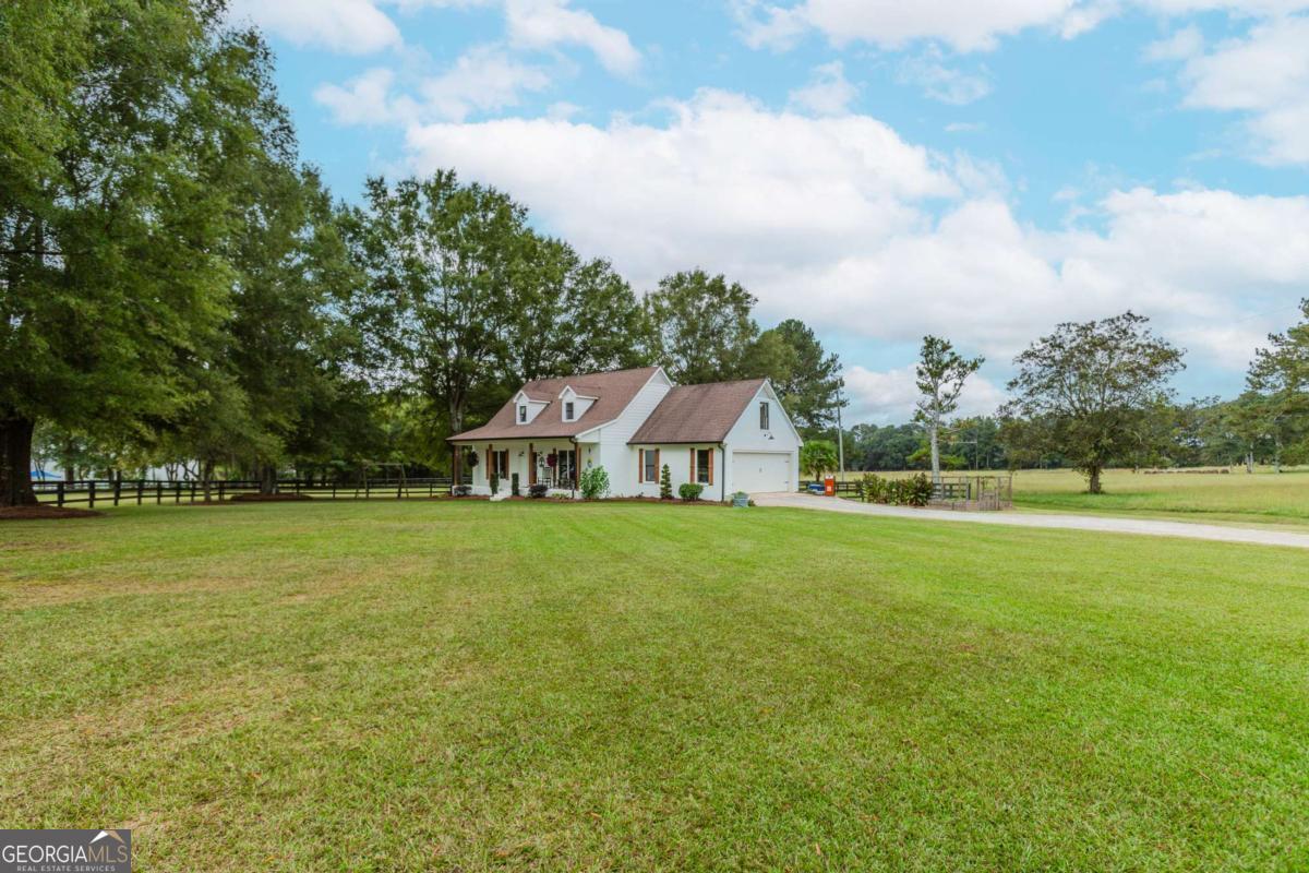 6441 Hog Mountain Road Bogart, GA 30622 - Photo 53 of 57 a view of a house with a big yard