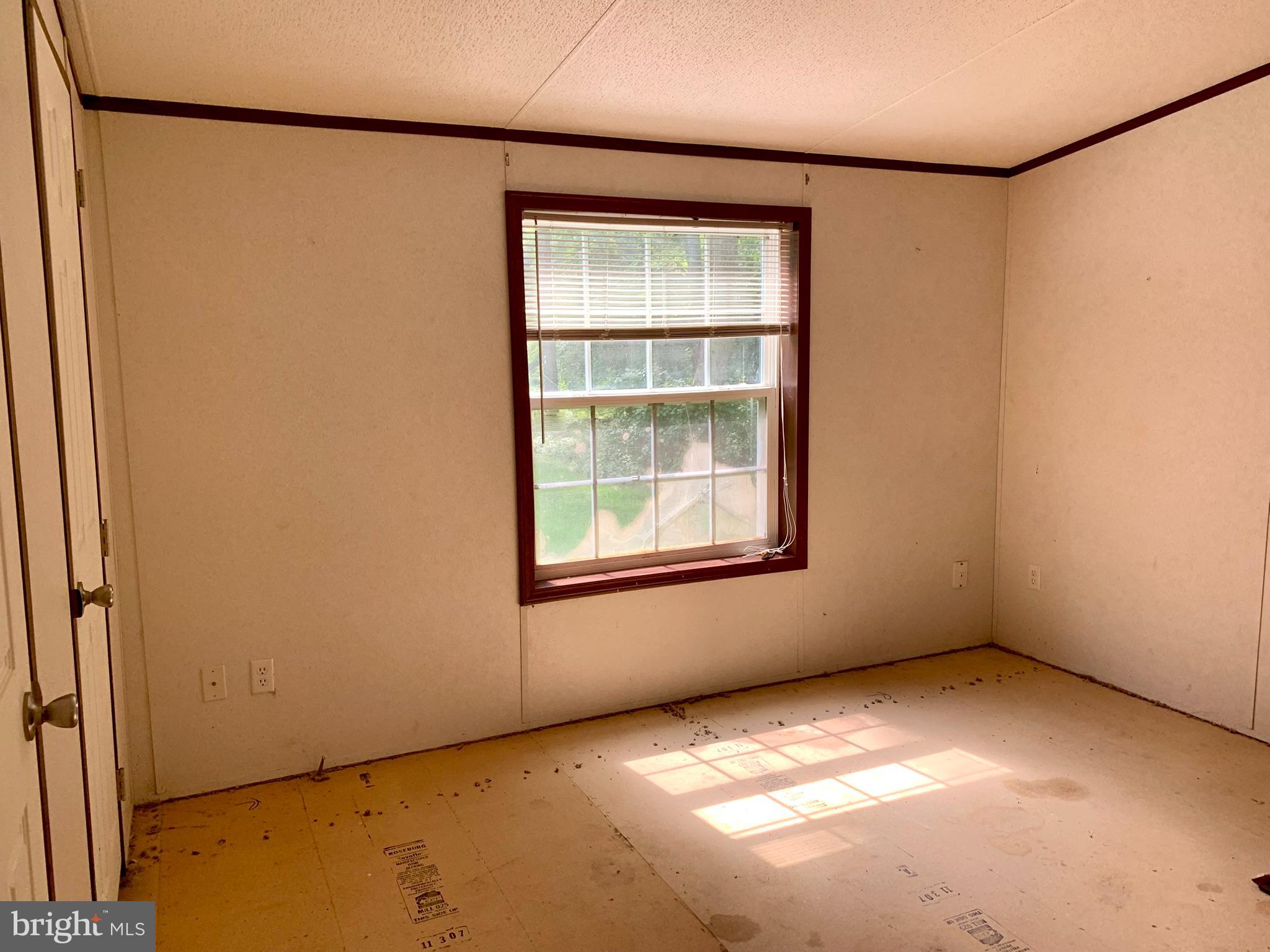 776 Pony Track Road Camden Wyoming, DE 19934 - Photo 11 of 18 an empty room with a window