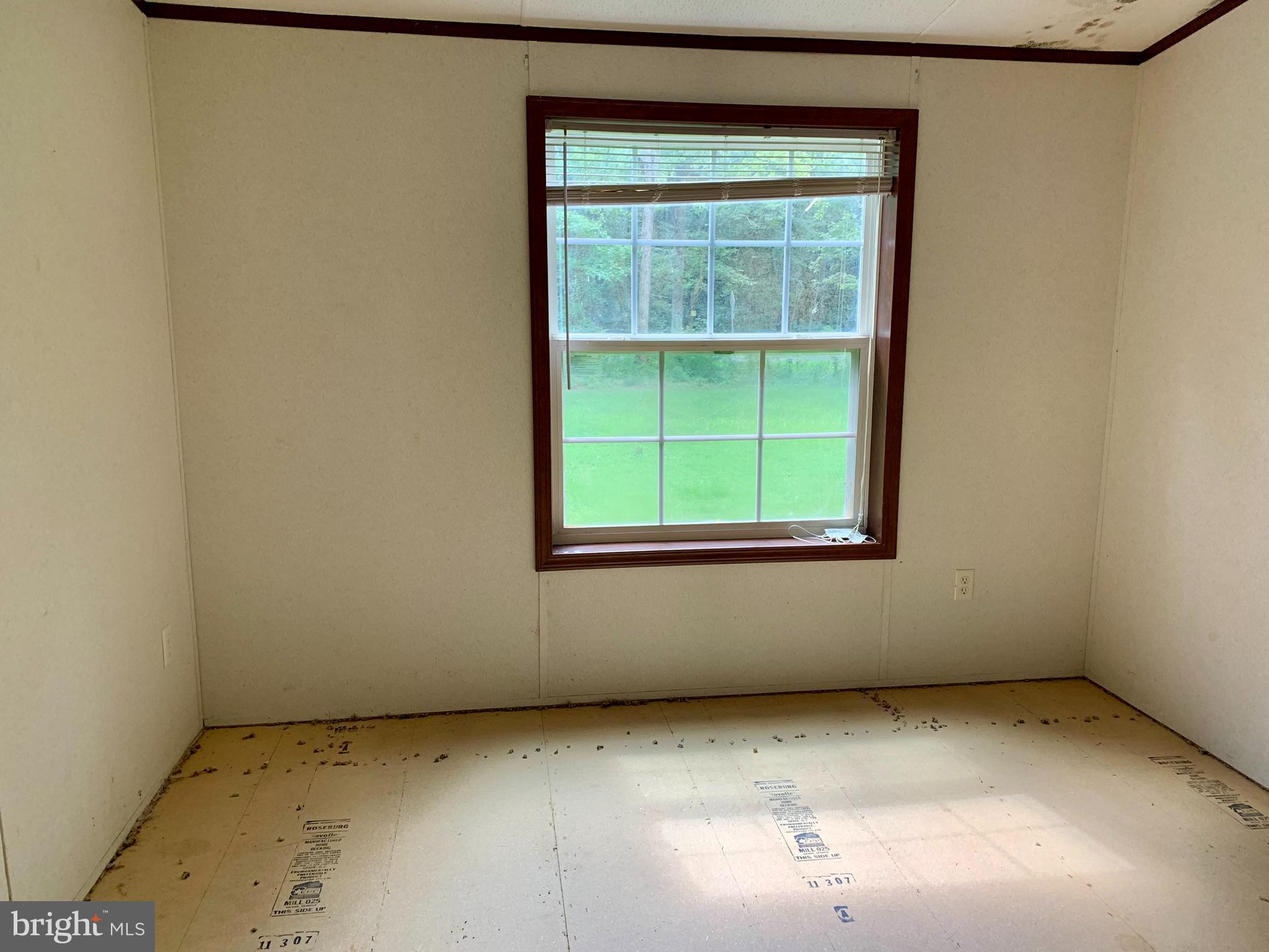 776 Pony Track Road Camden Wyoming, DE 19934 - Photo 14 of 18 an empty room with a window