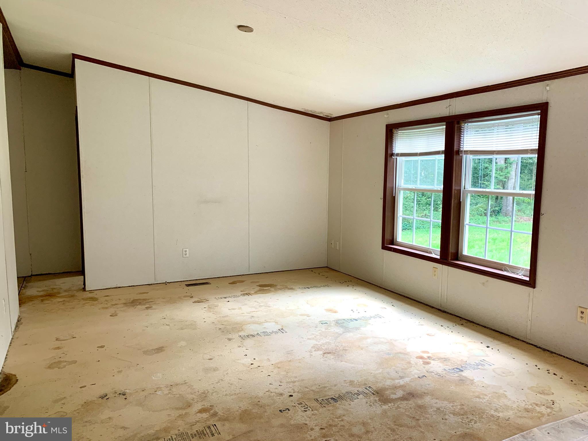 776 Pony Track Road Camden Wyoming, DE 19934 - Photo 5 of 18 a view of an empty room with a window