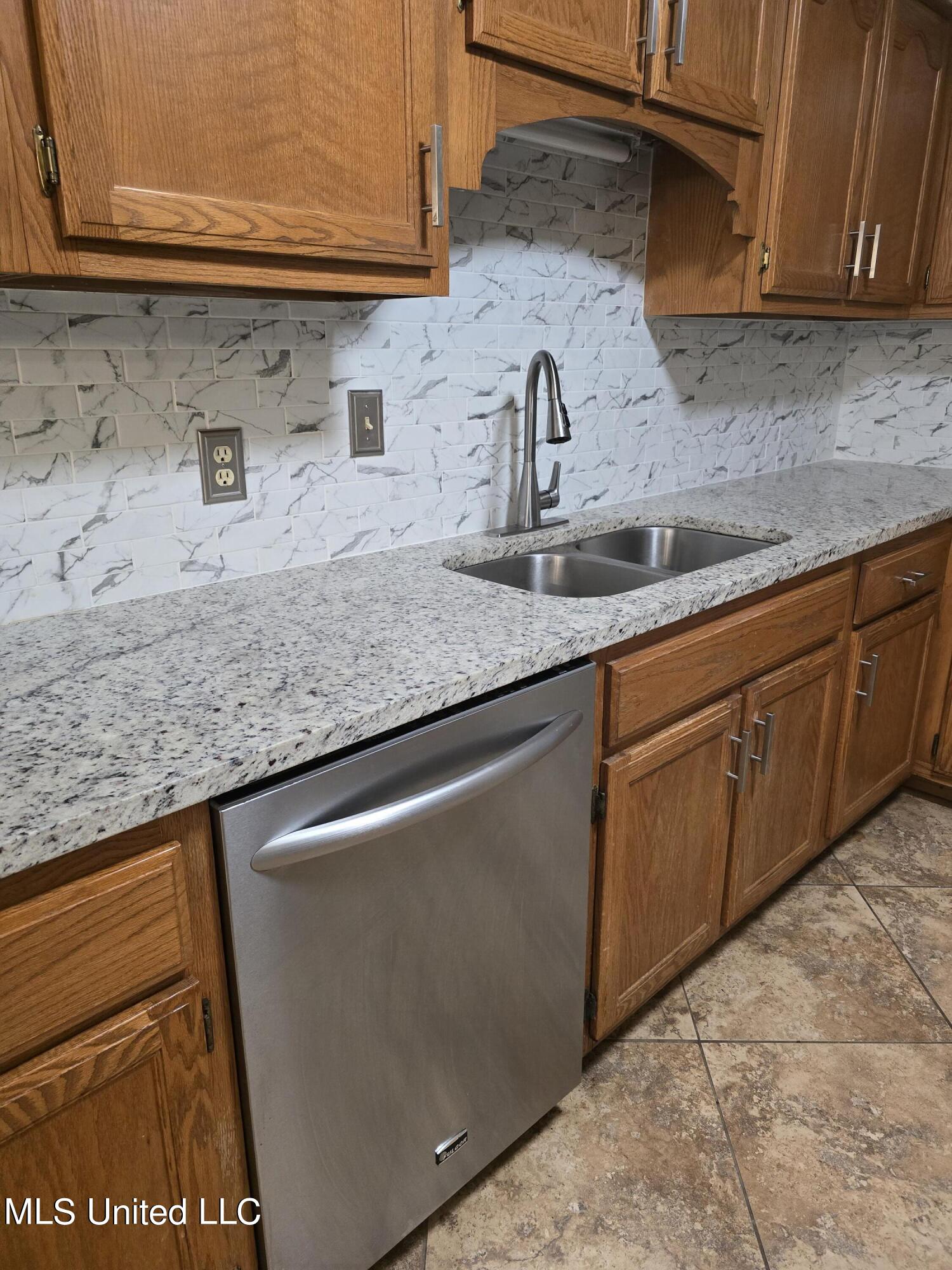 2418 Country Club Road Senatobia, MS 38668 - Photo 9 of 11 New photo Kitchen sink