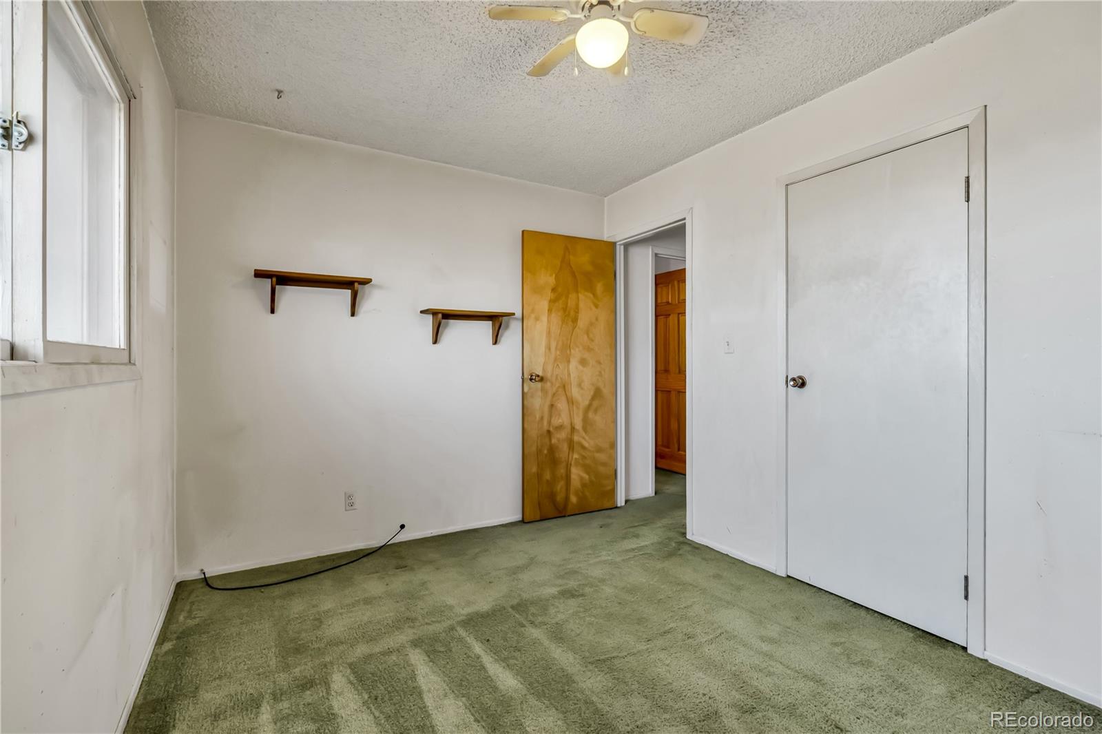 754 Highway 86 Elizabeth, CO 80107 - Photo 31 of 47 a view of an empty room with a window