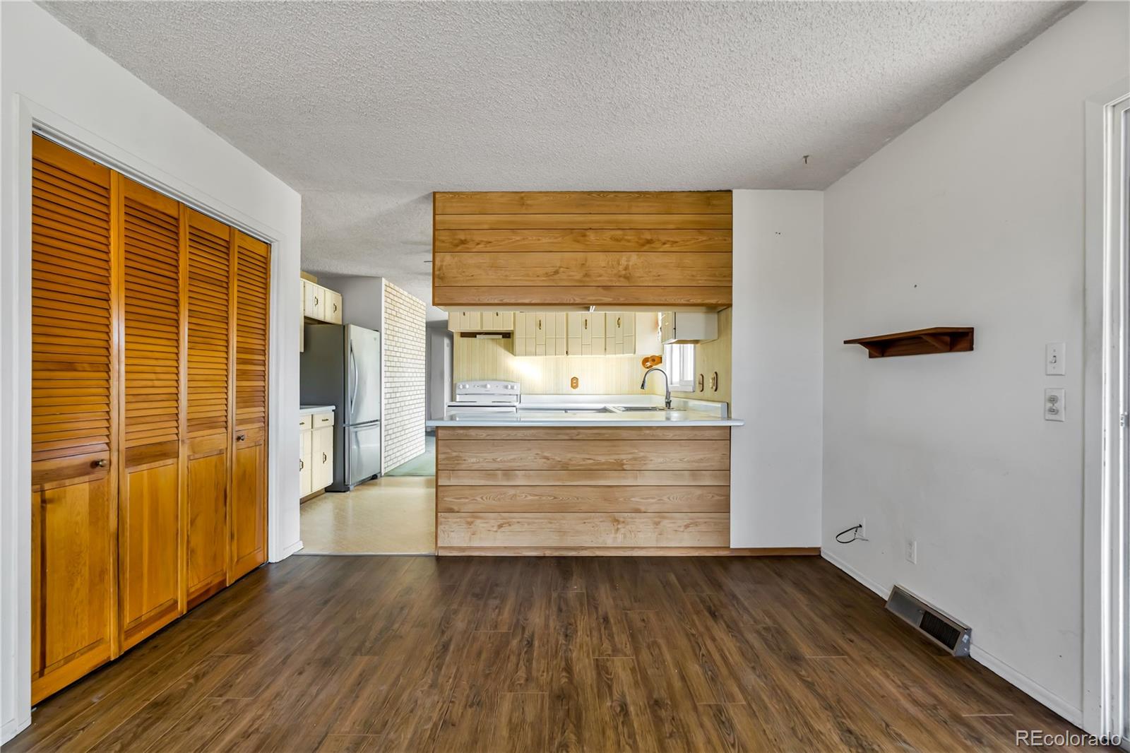754 Highway 86 Elizabeth, CO 80107 - Photo 35 of 47 a view of front door with wooden floor and a window