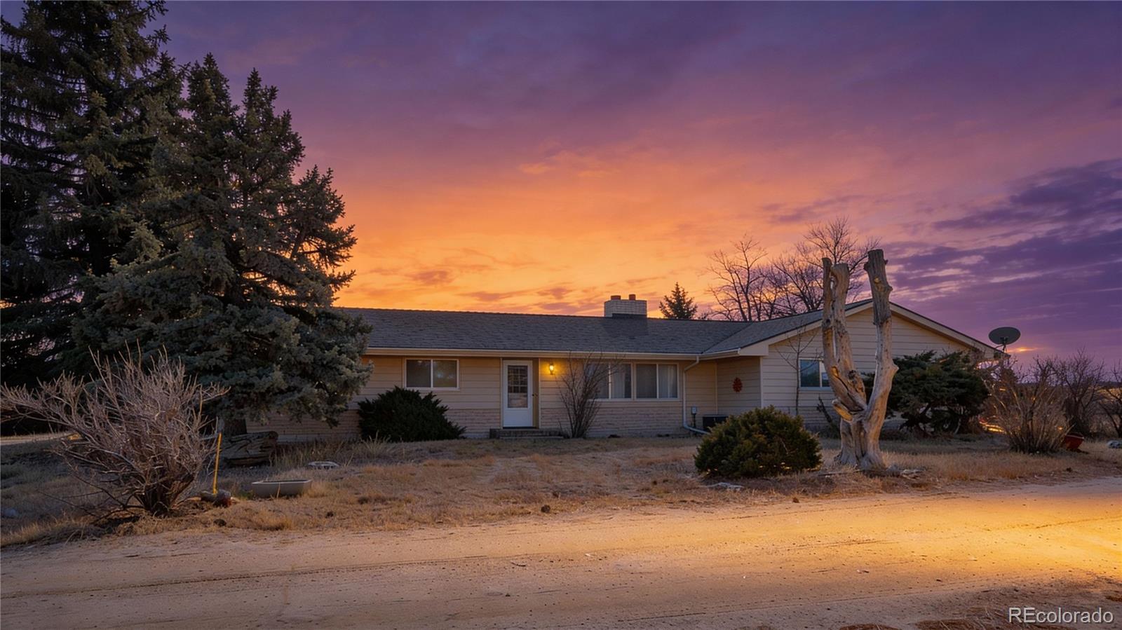754 Highway 86 Elizabeth, CO 80107 - Photo 46 of 47 a view of a house with a patio