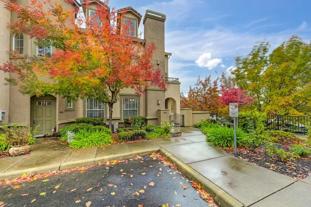 a front view of a building with garden