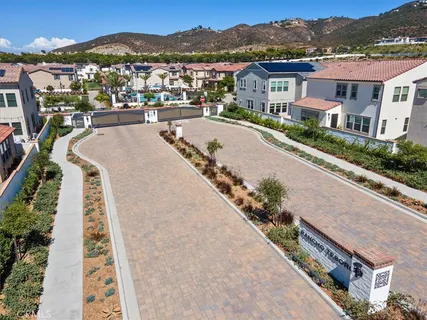 a view of a house with outdoor space and swimming pool