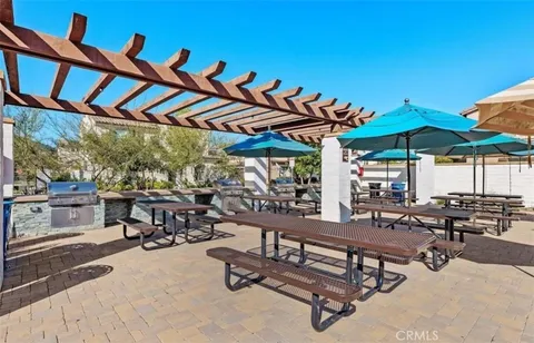 an aerial view of residential building with parking space