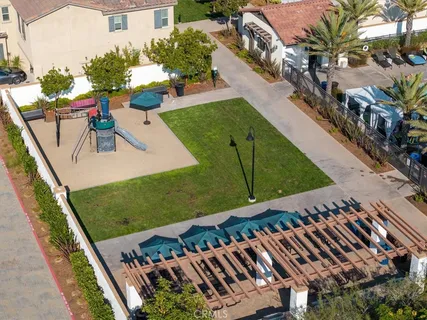 a view of a ocean with mountains in the background