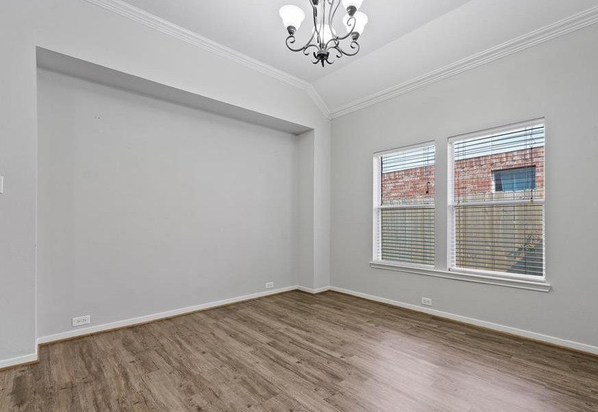 31030 Imperial Walk Lane Spring, TX 77386 - Photo 5 of 19 a view of empty room with wooden floor and fan