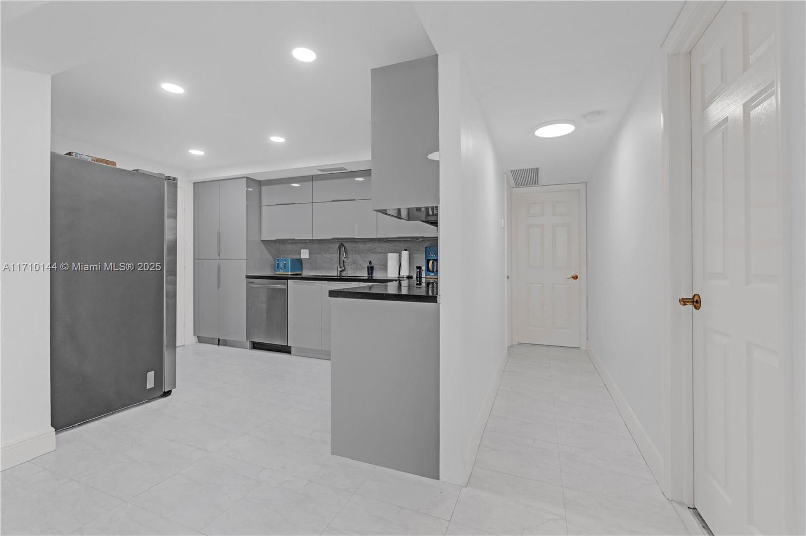 1600 South Ocean Drive, Unit 2F Hollywood, FL 33019 - Photo 12 of 30 a view of kitchen refrigerator and window