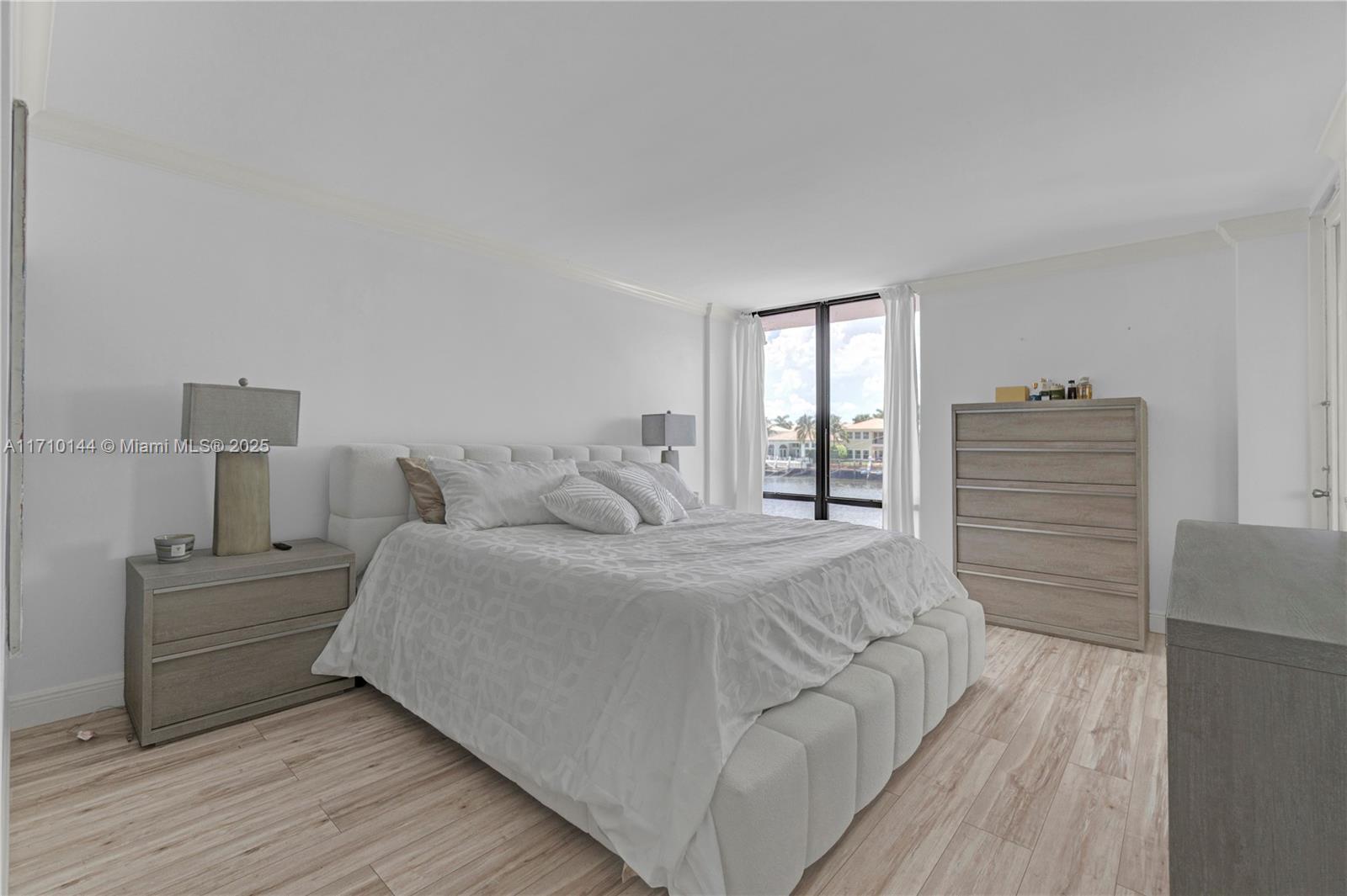 1600 South Ocean Drive, Unit 2F Hollywood, FL 33019 - Photo 17 of 30 a bed room with a bed and a window