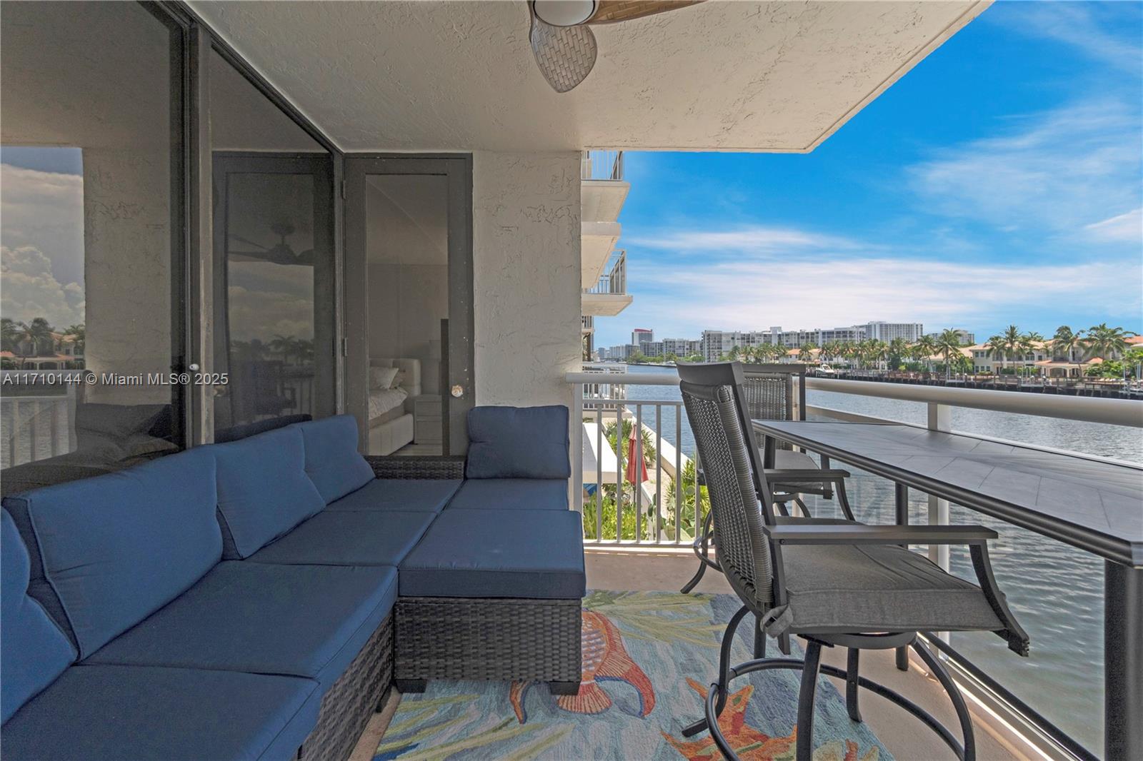 1600 South Ocean Drive, Unit 2F Hollywood, FL 33019 - Photo 22 of 30 a balcony with table and chairs
