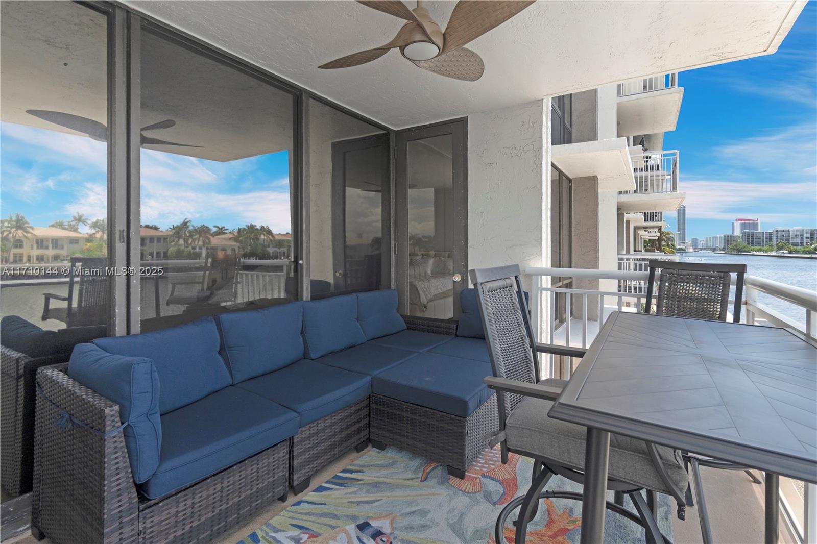1600 South Ocean Drive, Unit 2F Hollywood, FL 33019 - Photo 23 of 30 a living room with furniture a large window and a table