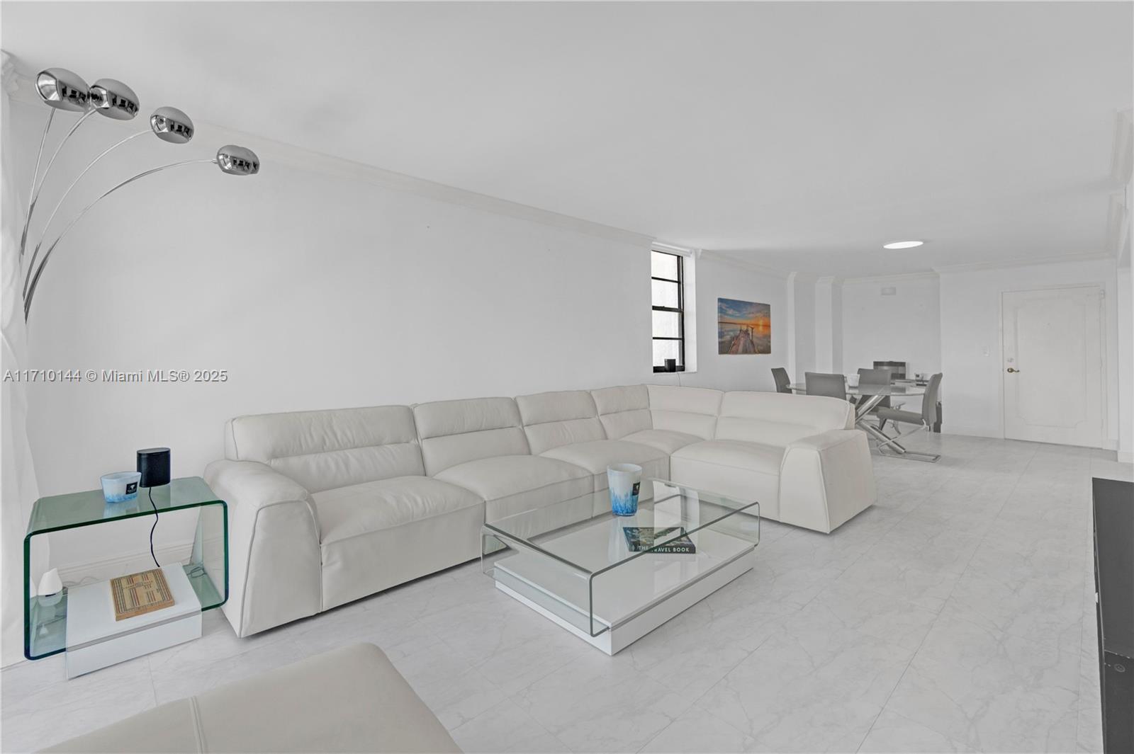 1600 South Ocean Drive, Unit 2F Hollywood, FL 33019 - Photo 4 of 30 a living room with furniture and a wooden floor