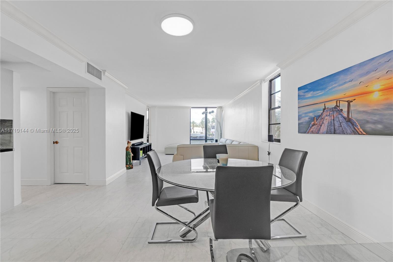 1600 South Ocean Drive, Unit 2F Hollywood, FL 33019 - Photo 6 of 30 a view of a dining room with furniture and a window