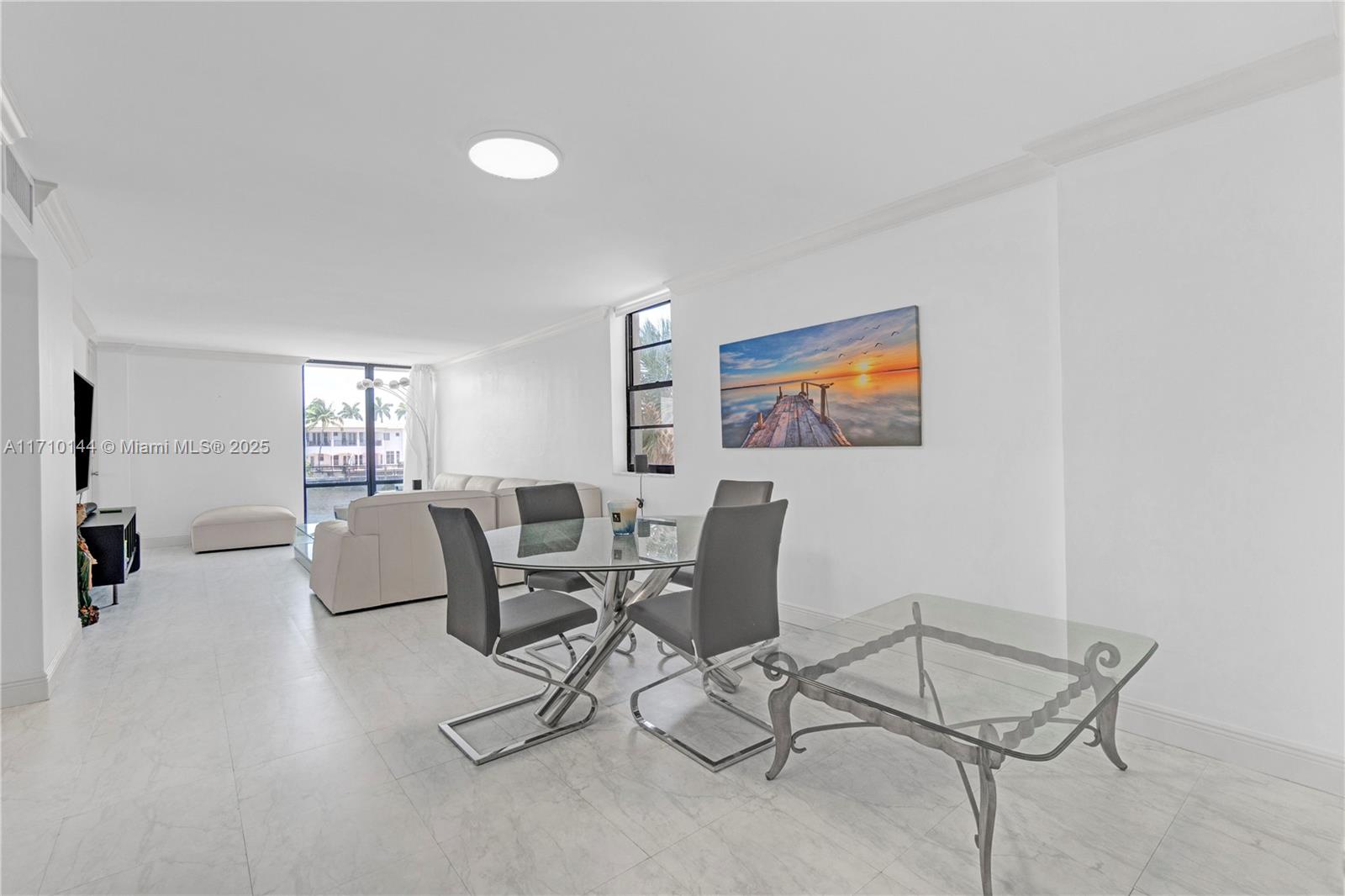 1600 South Ocean Drive, Unit 2F Hollywood, FL 33019 - Photo 8 of 30 a living room with furniture and a window