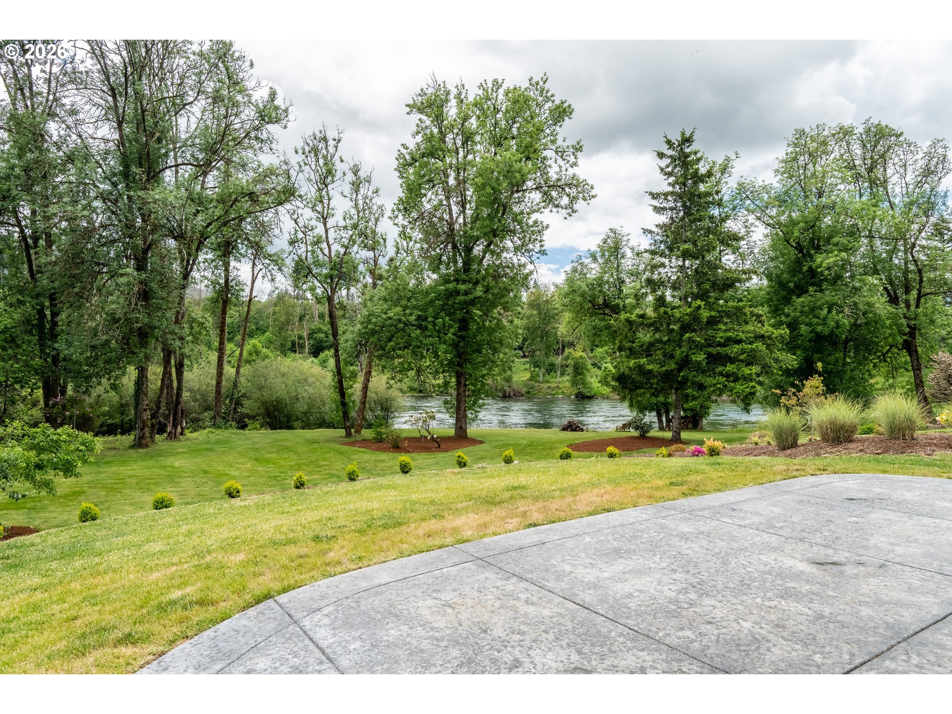 45542 South Gate Creek Road Vida, OR 97488 - Photo 22 of 46 a view of a swimming pool and a yard