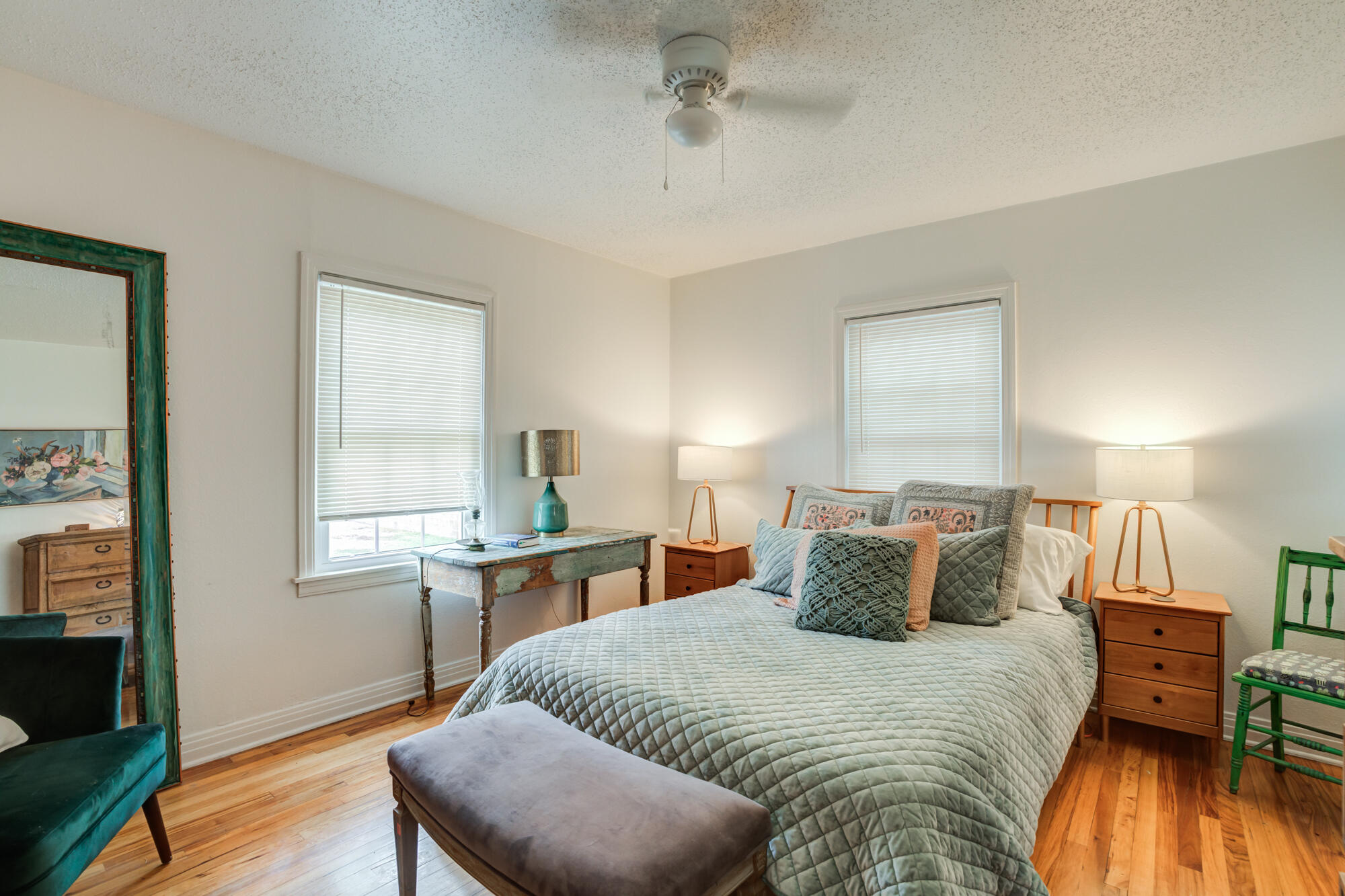 2826 33rd Street Lubbock, TX 79410 - Photo 13 of 33 a bedroom with a bed and wooden floor