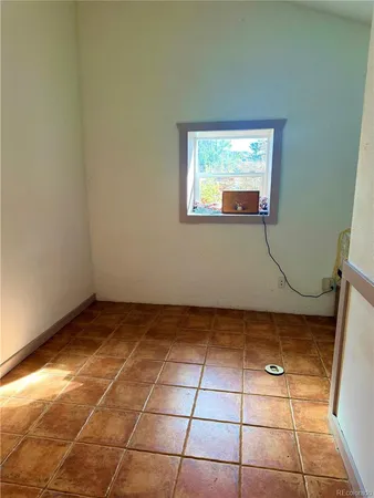 a view of a hardwood & utility room