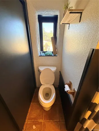 a view of entryway with a flat screen tv