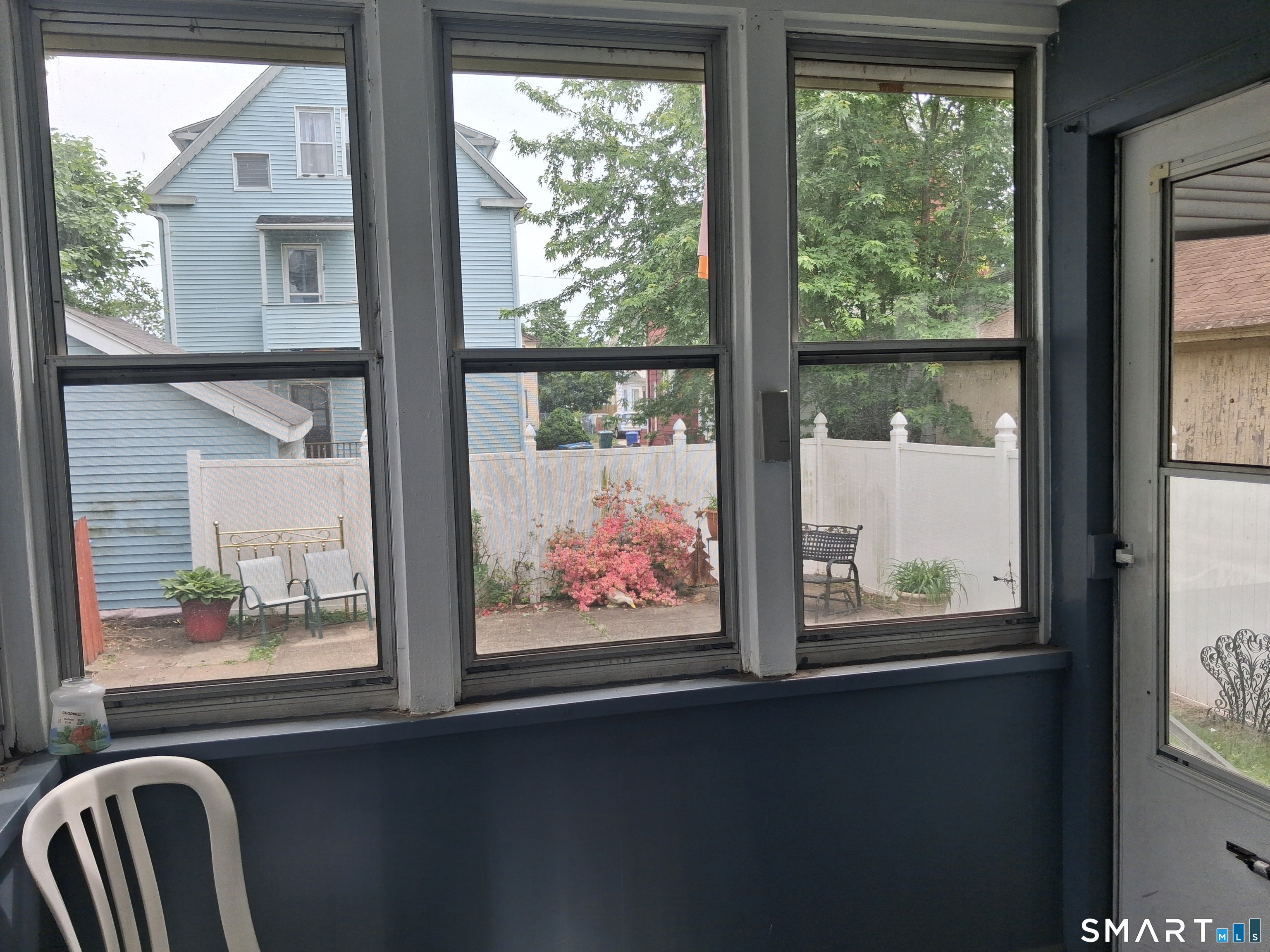26 4th Street Hamden, CT 06514 - Photo 20 of 40 a view of a balcony with wooden floor and windows