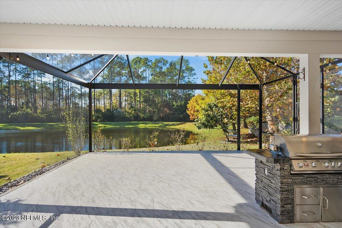 26 Woodview Court Ponte Vedra, FL 32081 - Photo 2 of 71 a view of swimming pool from a balcony