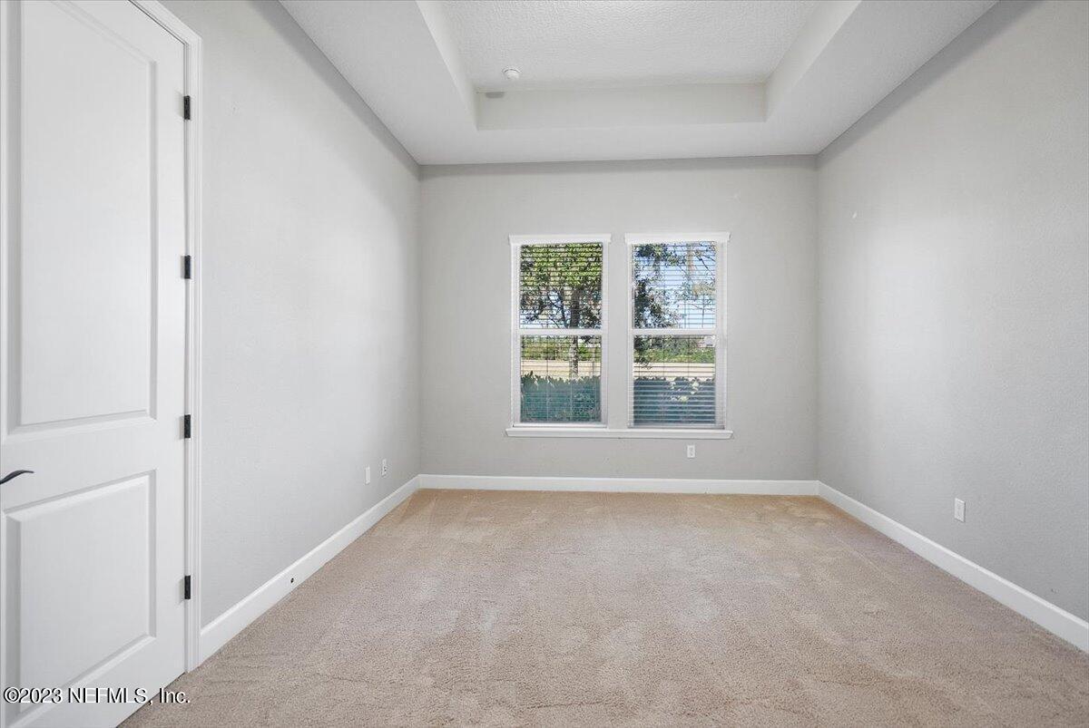 26 Woodview Court Ponte Vedra, FL 32081 - Photo 21 of 71 an empty room with windows