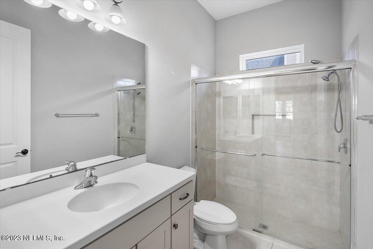 26 Woodview Court Ponte Vedra, FL 32081 - Photo 22 of 71 a bathroom with a sink toilet and shower