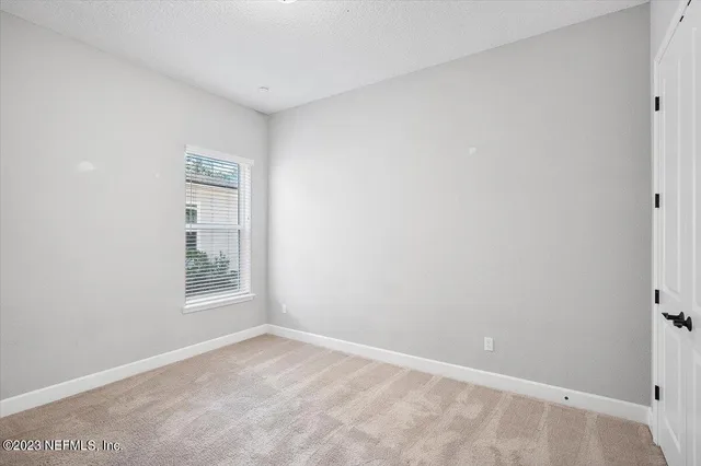 a view of a lake with sitting area