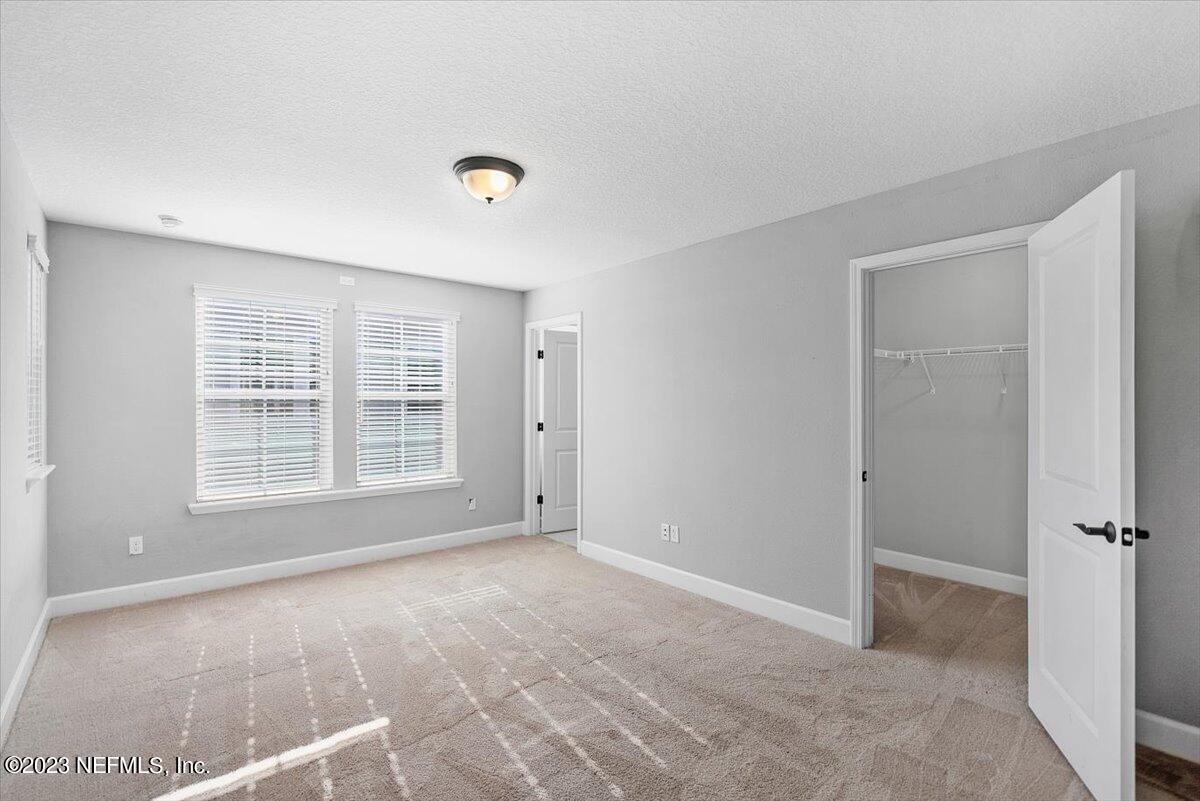 26 Woodview Court Ponte Vedra, FL 32081 - Photo 25 of 71 a view of an empty room with a window