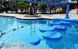 26 Woodview Court Ponte Vedra, FL 32081 - Photo 40 of 71 a view of a swimming pool with a patio