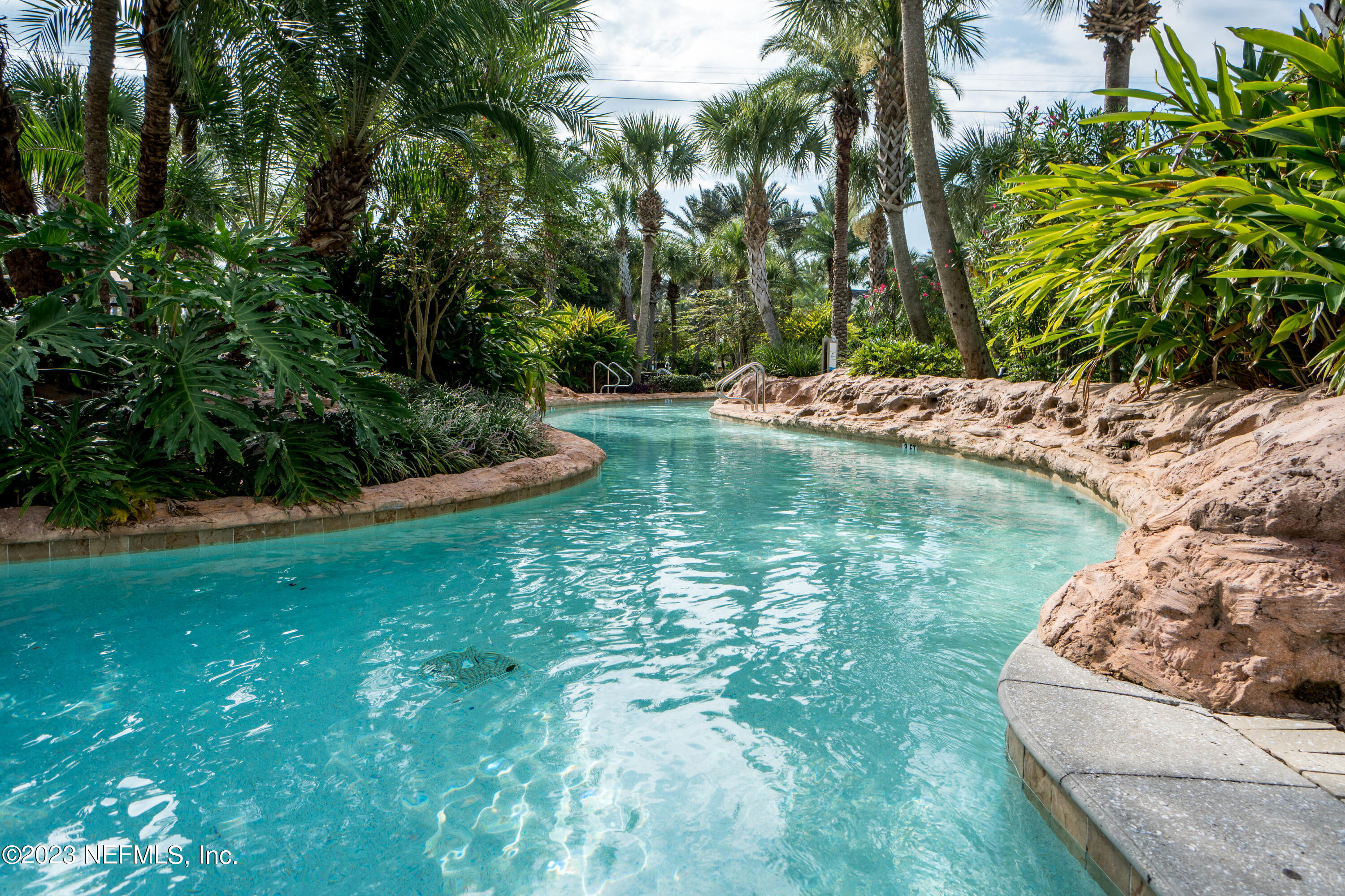 26 Woodview Court Ponte Vedra, FL 32081 - Photo 41 of 71 a view of a garden with a fountain