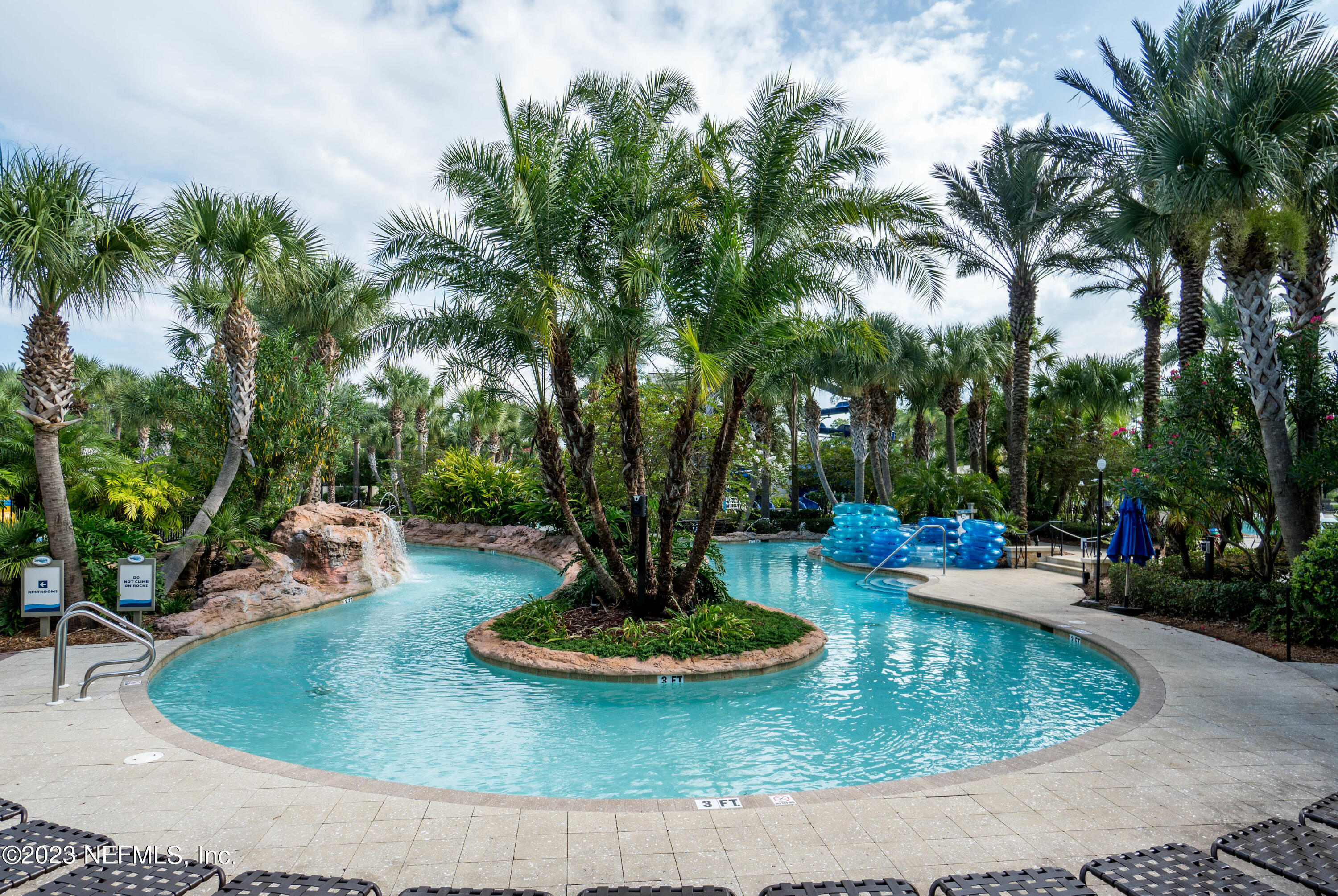 26 Woodview Court Ponte Vedra, FL 32081 - Photo 47 of 71 a view of a backyard with plants and palm tree