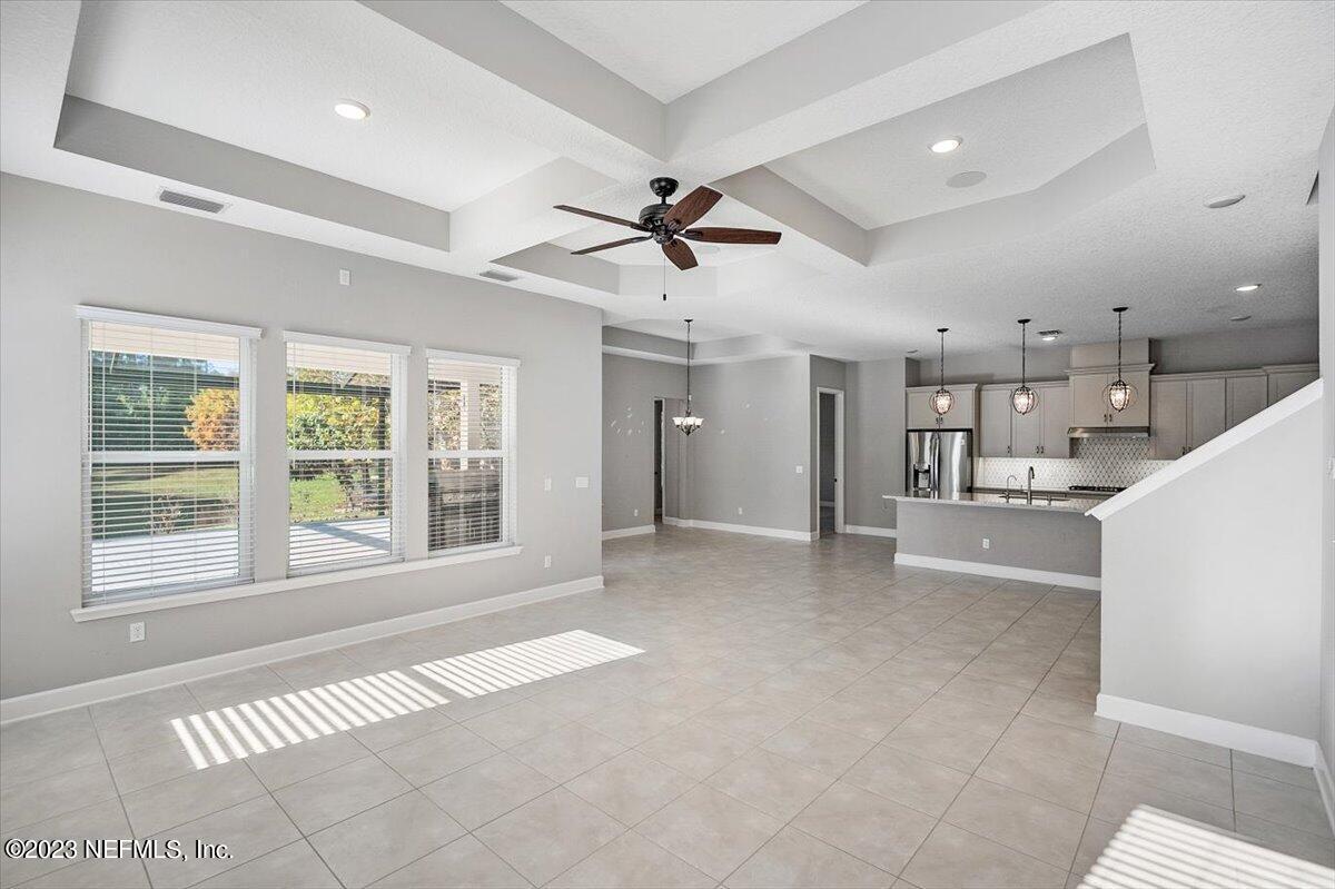 26 Woodview Court Ponte Vedra, FL 32081 - Photo 6 of 71 a view of a kitchen with a sink and a large window