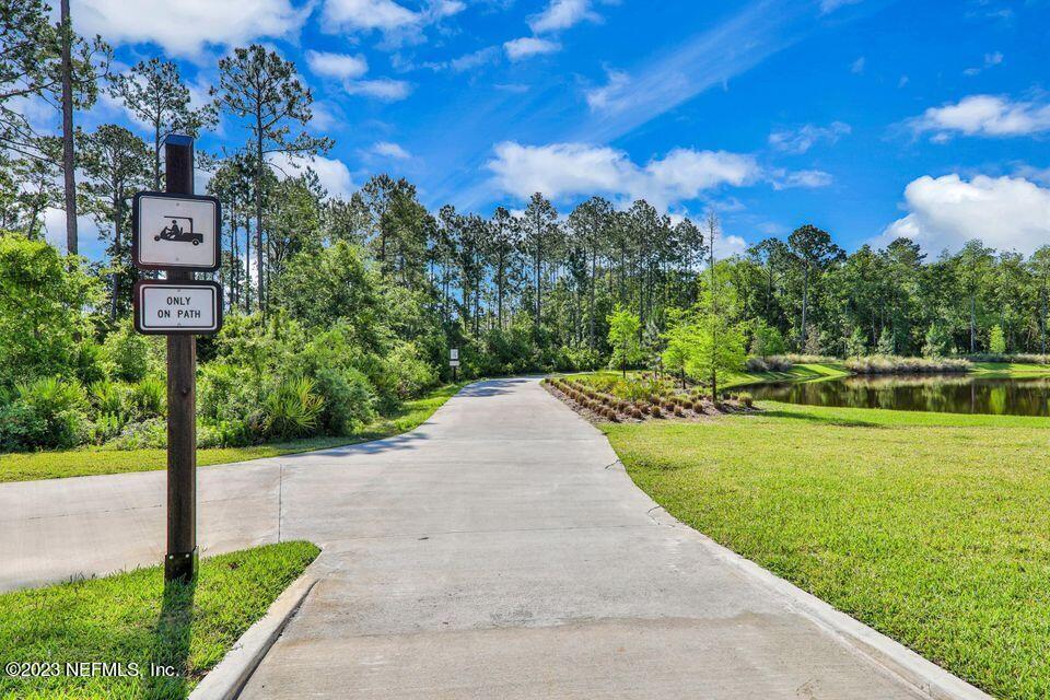 26 Woodview Court Ponte Vedra, FL 32081 - Photo 69 of 71 a view of a street with a building in the background