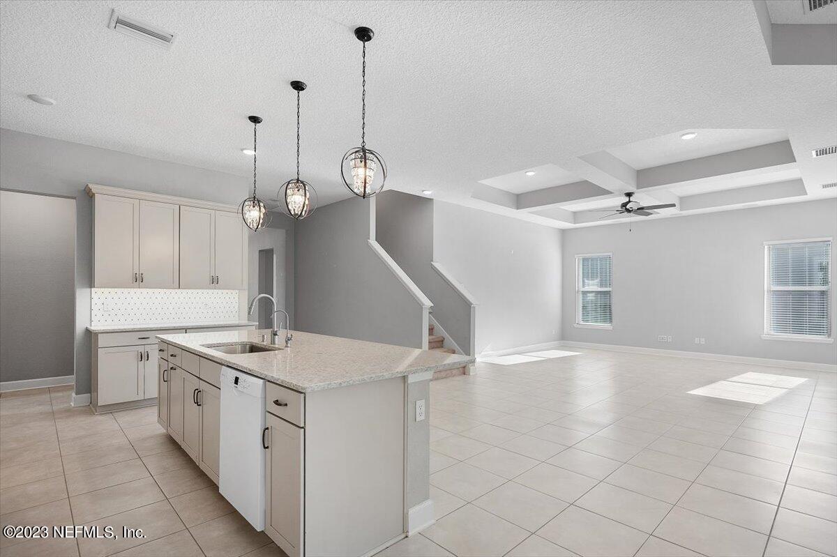 26 Woodview Court Ponte Vedra, FL 32081 - Photo 10 of 71 a kitchen with a sink appliances and cabinets