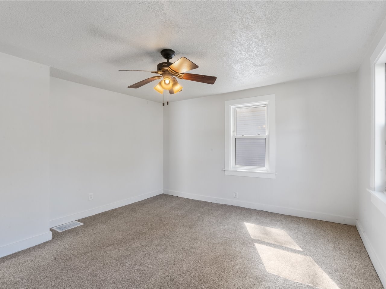 1186 24th Street Moline, IL 61265 - Photo 14 of 27 a view of a room with a fan