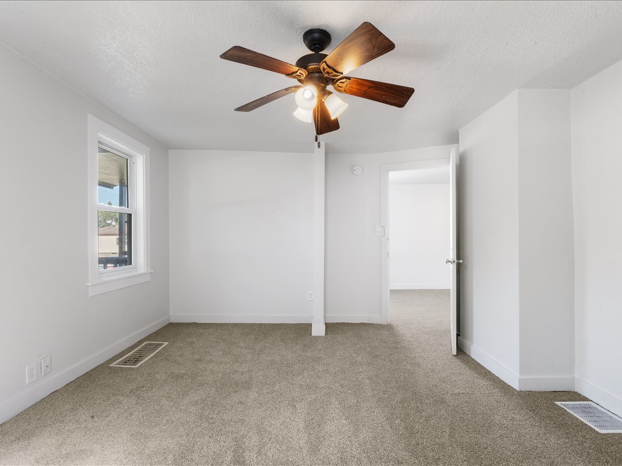 1186 24th Street Moline, IL 61265 - Photo 15 of 27 a view of an empty room with a window