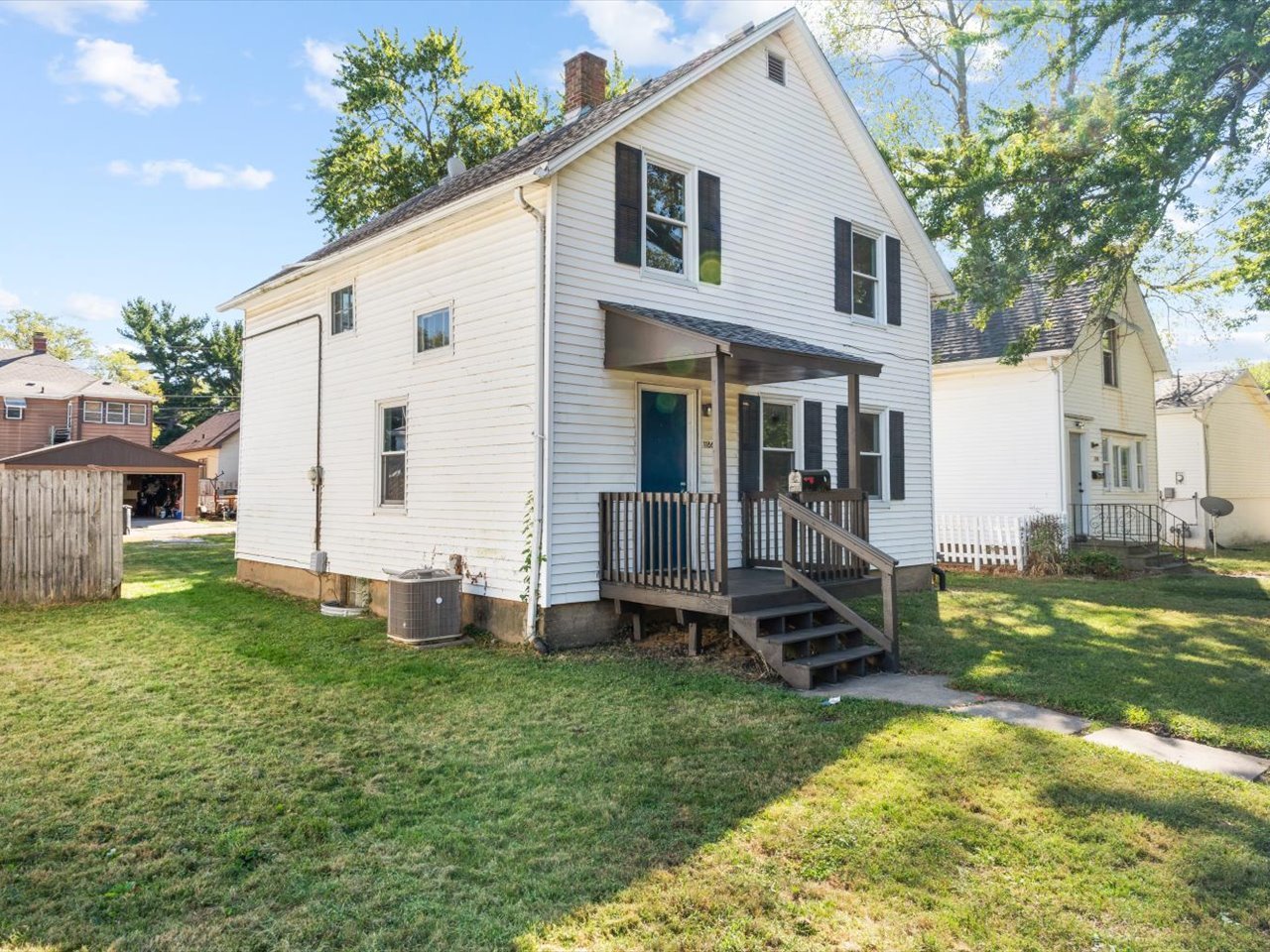 1186 24th Street Moline, IL 61265 - Photo 3 of 27 a view of a house with backyard
