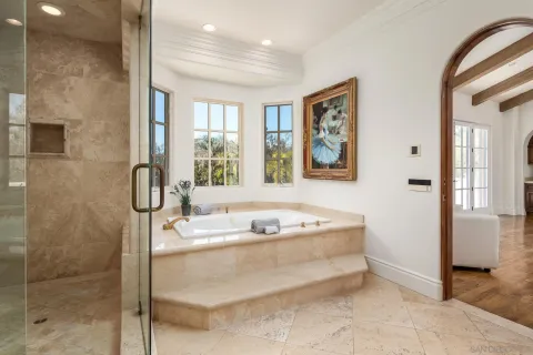 a bathroom with a double vanity sink mirror and double