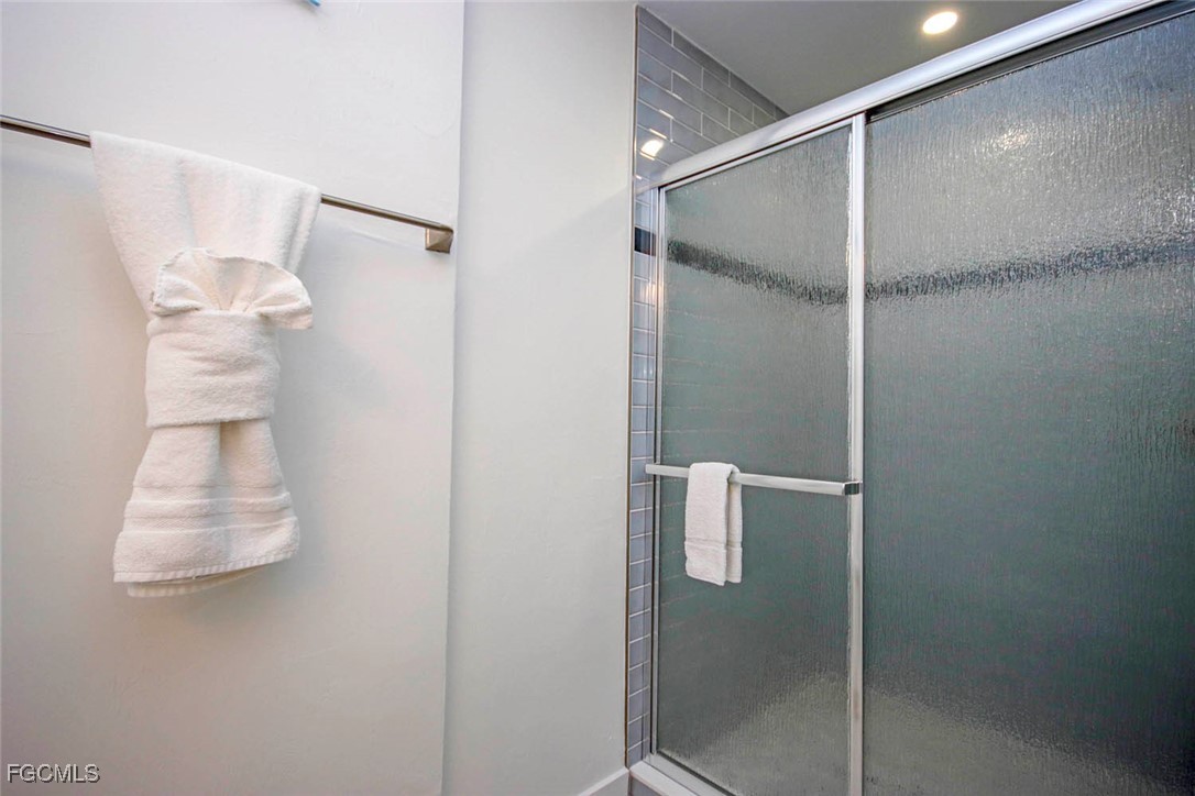 5117 Sea Bell Road, Unit E103 Sanibel, FL 33957 - Photo 24 of 24 a bathroom with a shower