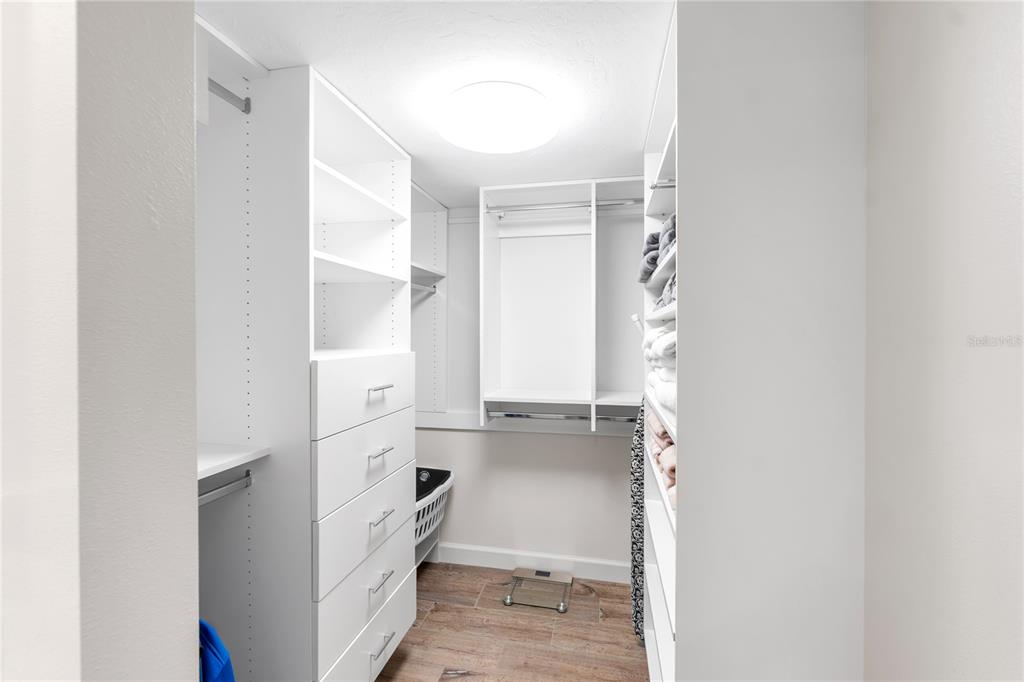 1000 Longboat Club Road, Unit 204 Longboat Key, FL 34228 - Photo 33 of 66 a bathroom with a tub sink and mirror