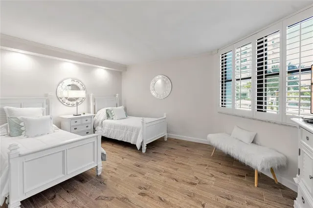 a kitchen with stainless steel appliances a stove a sink and a refrigerator